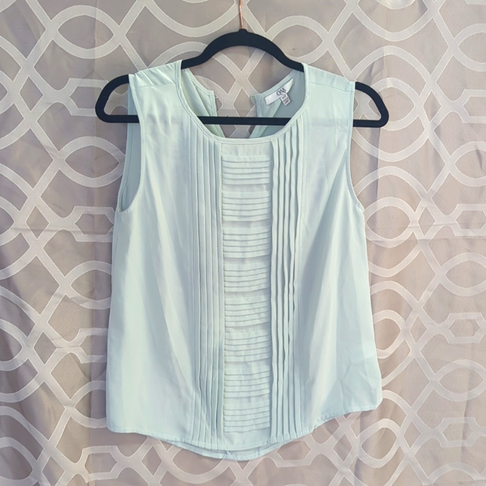 Sleeveless light mint green blouse
